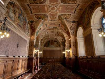 Nel 1924 venne coinvolto in due lavori, entrambi al fianco del ben pi� noto pittore veneziano Mario Prayer. Il primo riguard� la direzione artistica della decorazione della memorabile Aula Magna dell�Ateneo, di ispirazione rinascimentale... 